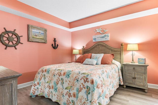 bedroom featuring light wood-type flooring