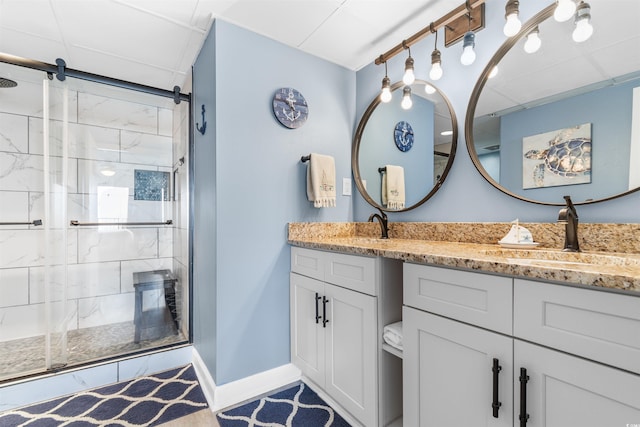 bathroom with vanity and walk in shower