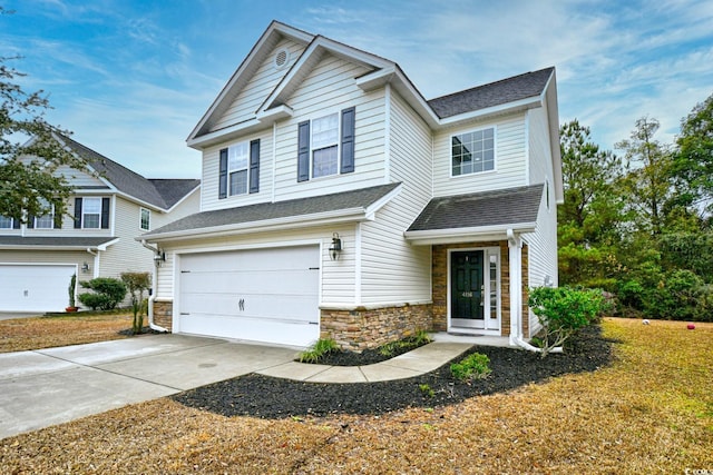 craftsman house featuring a garage