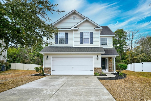 view of front of property featuring a garage