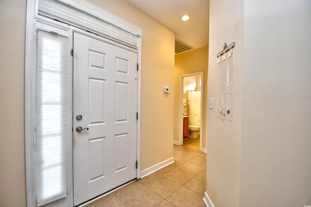 view of tiled foyer entrance