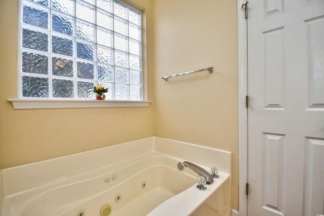 bathroom with a tub