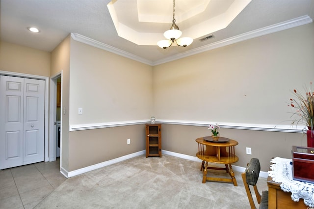 unfurnished room with a raised ceiling, light tile patterned floors, crown molding, and an inviting chandelier