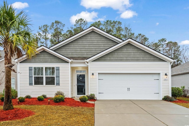 view of front of property with a garage