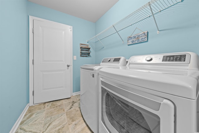 4463 Livorn Loop Unit 4463, Myrtle Beach, SC 29579 - washroom with washer and clothes dryer, laundry area, and baseboards