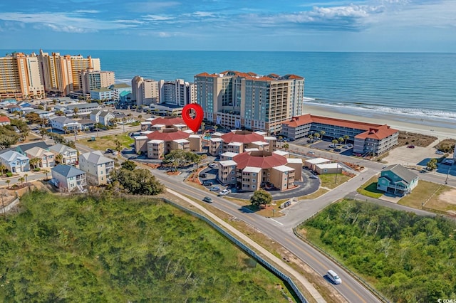 aerial view featuring a beach view and a water view