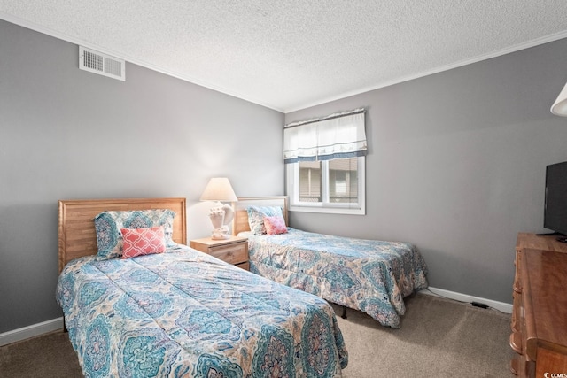 carpeted bedroom featuring a textured ceiling and crown molding