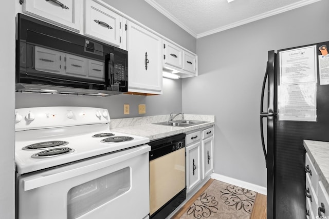 kitchen with white electric range, sink, stainless steel dishwasher, a textured ceiling, and white cabinetry