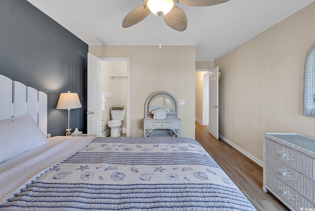 bedroom with ensuite bathroom, ceiling fan, ornamental molding, and hardwood / wood-style flooring