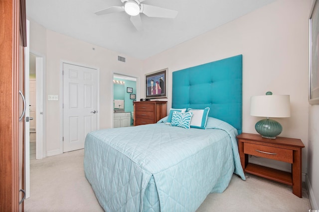 bedroom featuring ceiling fan and light colored carpet