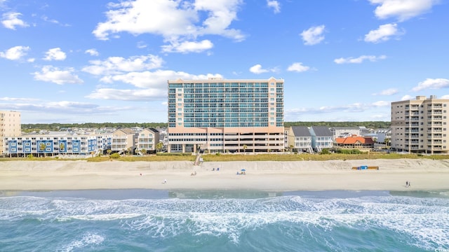 aerial view with a view of the beach and a water view