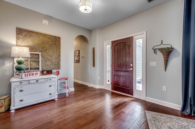 entrance foyer featuring hardwood / wood-style flooring