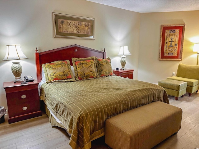 bedroom featuring light hardwood / wood-style floors