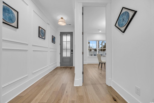 foyer with light hardwood / wood-style flooring