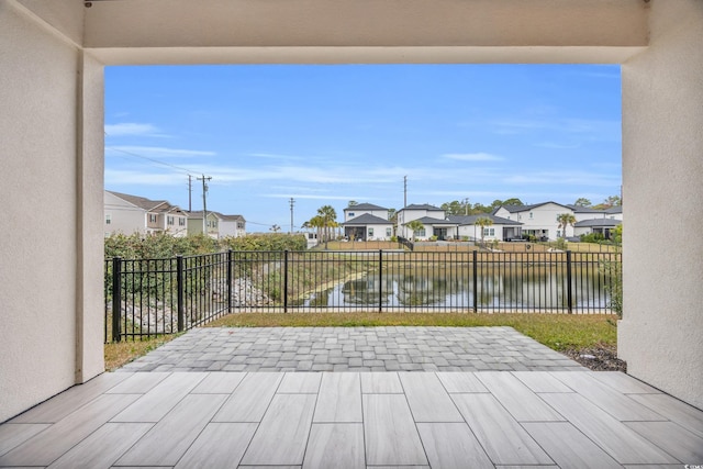 view of patio / terrace featuring a water view