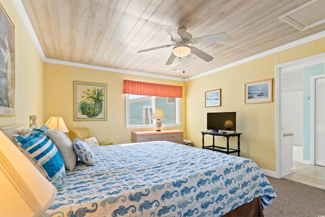 431 28th St S, Sunset Beach, NC 28468 - carpeted bedroom with wooden ceiling, ceiling fan, and ornamental molding