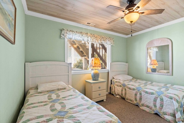 431 28th St S, Sunset Beach, NC 28468 - carpeted bedroom featuring ceiling fan, wooden ceiling, and ornamental molding