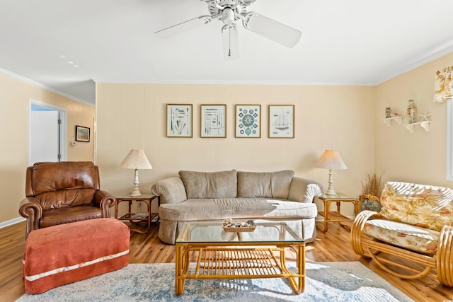 431 28th St S, Sunset Beach, NC 28468 - living room with hardwood / wood-style floors, ceiling fan, and ornamental molding