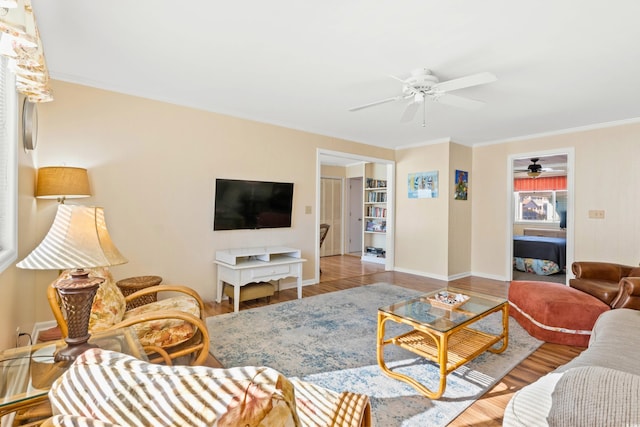 431 28th St S, Sunset Beach, NC 28468 - living room with light hardwood / wood-style flooring and crown molding