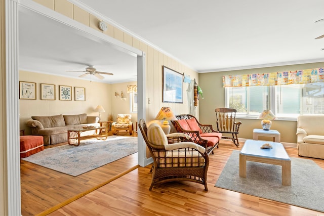 431 28th St S, Sunset Beach, NC 28468 - living room featuring hardwood / wood-style flooring, ceiling fan, and ornamental molding