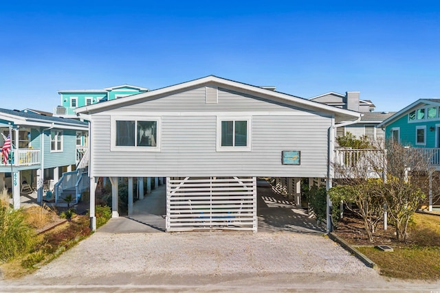 431 28th St S, Sunset Beach, NC 28468 - back of house with a carport