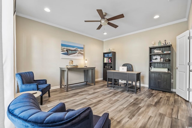 office space featuring hardwood / wood-style flooring, ceiling fan, and crown molding