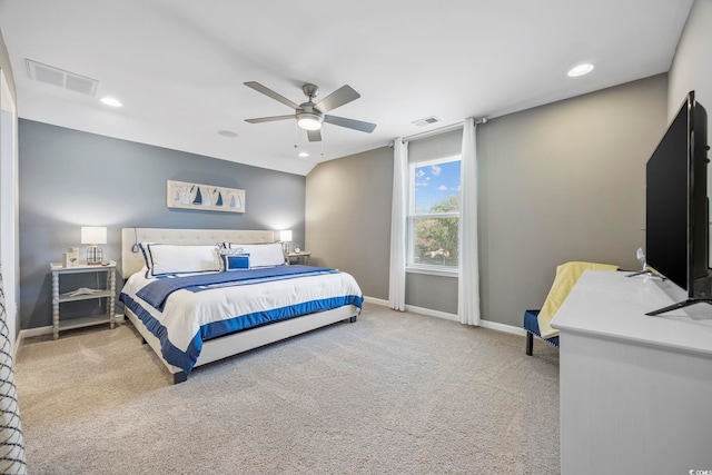 bedroom featuring ceiling fan and light carpet