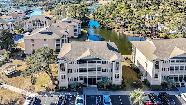 drone / aerial view featuring a water view