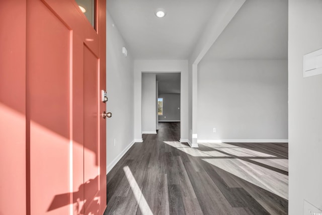 interior space with dark wood-type flooring