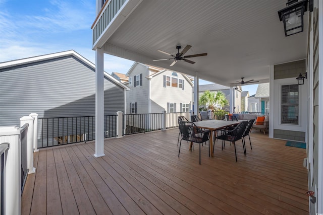 wooden deck with ceiling fan