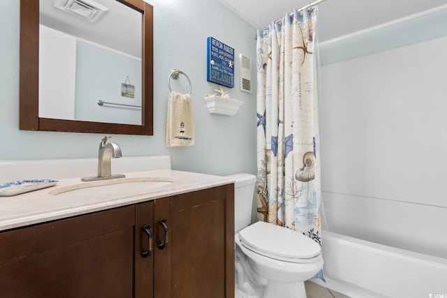 full bathroom featuring vanity, shower / tub combo, and toilet