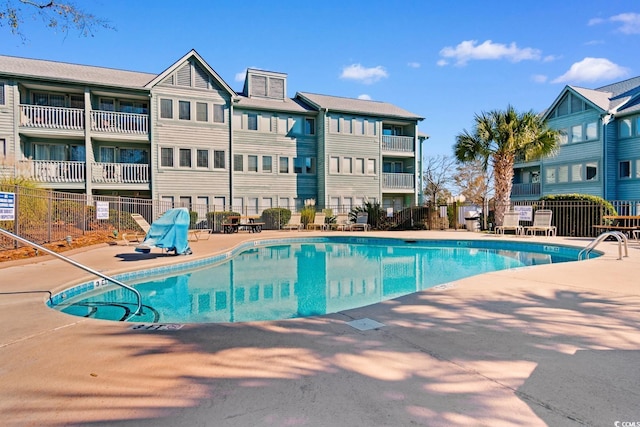 view of pool featuring a patio