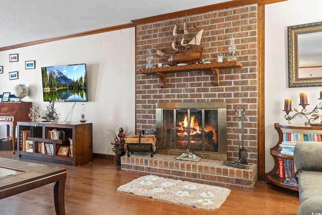702 Plantation Dr, Surfside Beach, SC 29575 - living area with crown molding, wood finished floors, baseboards, and a fireplace