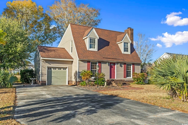 702 Plantation Dr, Surfside Beach, SC 29575 - new england style home with driveway, a garage, and a chimney