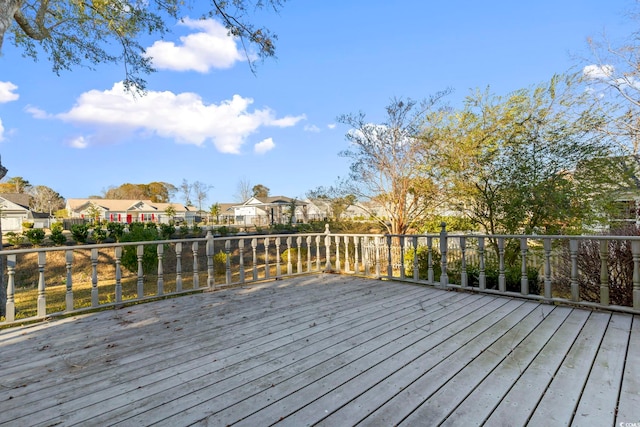 702 Plantation Dr, Surfside Beach, SC 29575 - wooden deck featuring a residential view