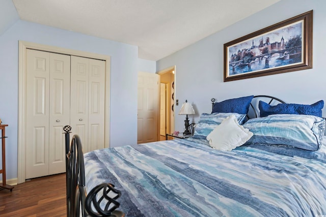 702 Plantation Dr, Surfside Beach, SC 29575 - bedroom with wood finished floors and a closet