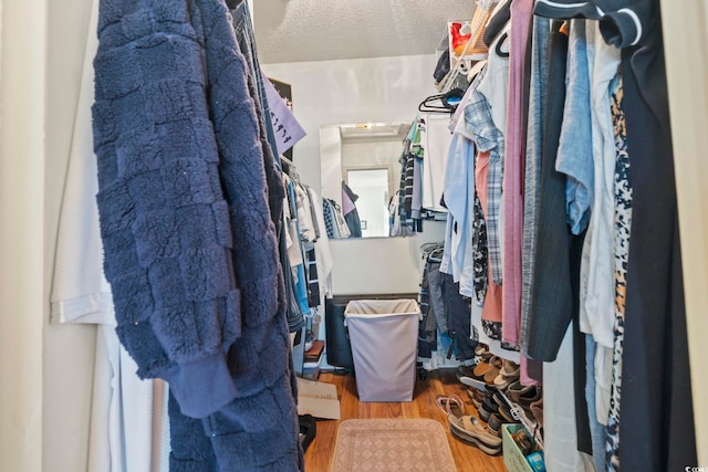 702 Plantation Dr, Surfside Beach, SC 29575 - walk in closet with wood finished floors
