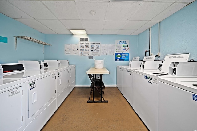 laundry area featuring carpet and washer and clothes dryer