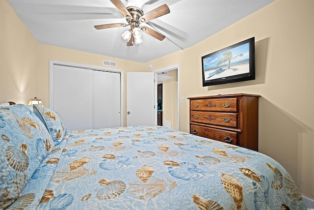 bedroom featuring ceiling fan and a closet