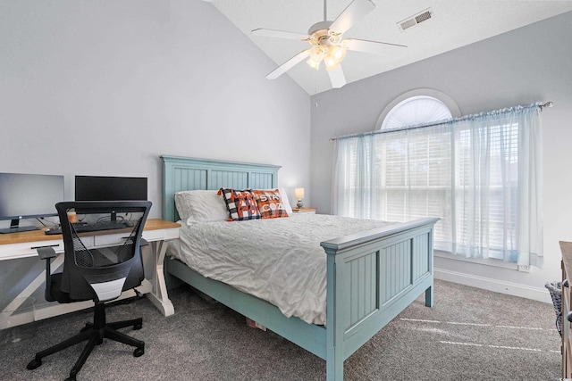 bedroom featuring ceiling fan, dark carpet, lofted ceiling, and multiple windows