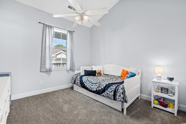 carpeted bedroom featuring ceiling fan and lofted ceiling