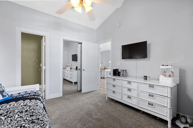 bedroom featuring ceiling fan, a closet, dark carpet, and lofted ceiling