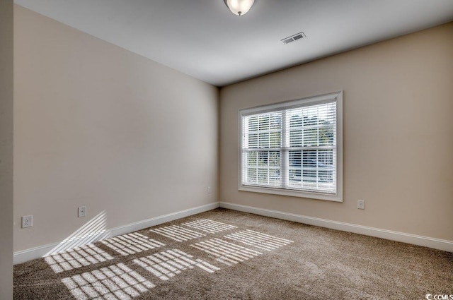 view of carpeted spare room