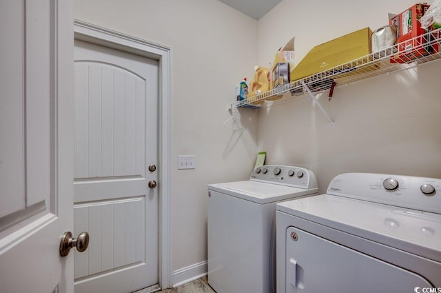 laundry room with washer and dryer