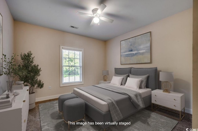 carpeted bedroom with ceiling fan