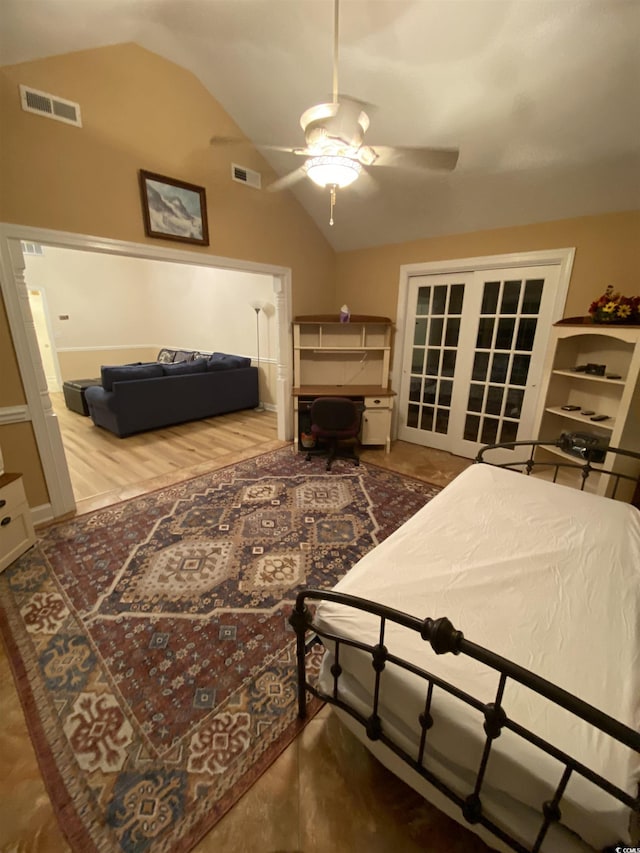 bedroom with hardwood / wood-style flooring, ceiling fan, and lofted ceiling