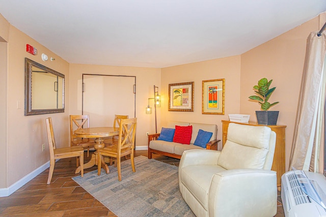 living room with dark hardwood / wood-style floors