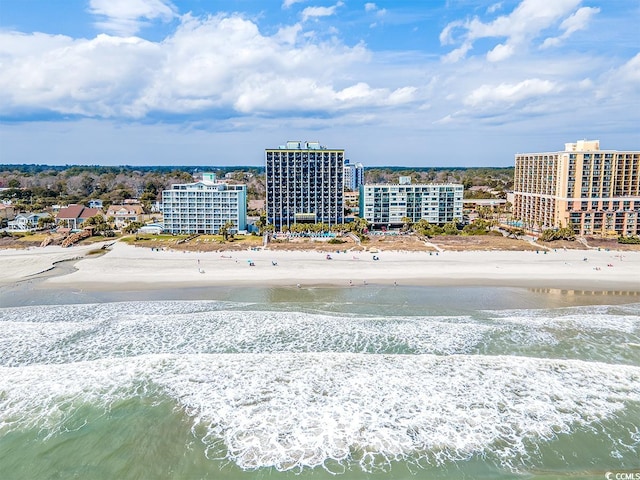 aerial view with a view of the beach and a water view