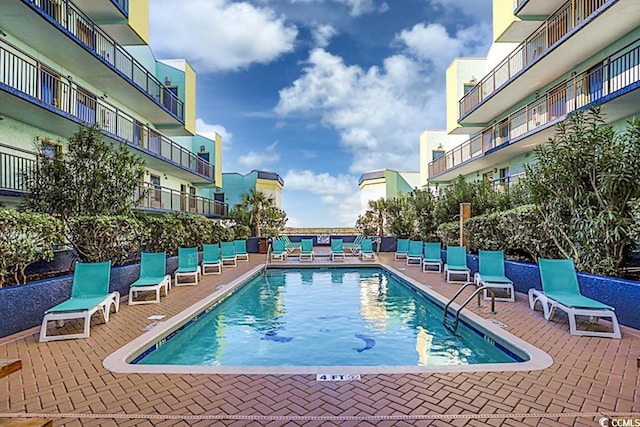 view of pool with a patio