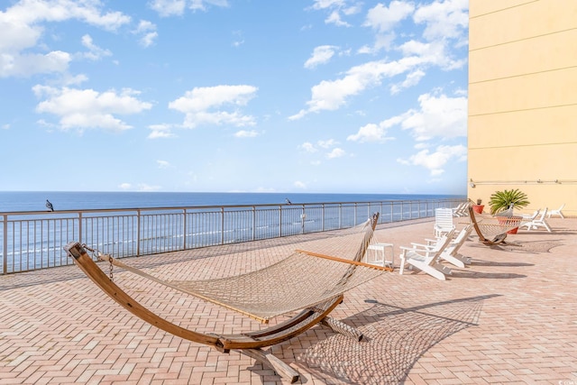 view of patio / terrace featuring a water view